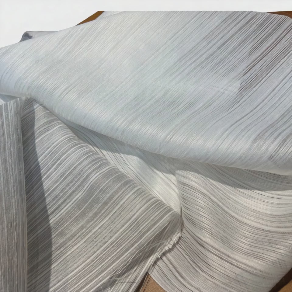 Detail texture of fire-retardant woven curtain fabric showing tight weave structure